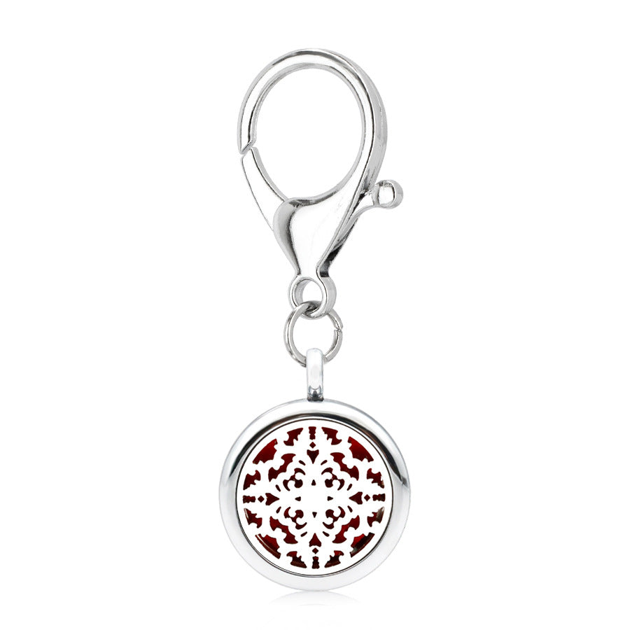 Wholesale 25MM Alloy Dog Paw Tree of Life Hollow Aromatherapy Essential Oil Keychain